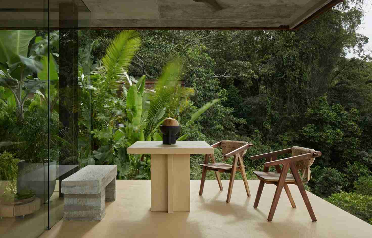 A pair of rammed-earth villas dissolve the boundary between jungle and sea in Costa Rica
