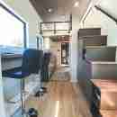 Luxury Tiny House Flaunts a Main-Floor Bedroom With a Fireplace