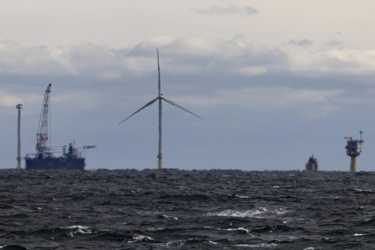 Turning blades send first commercial offshore wind power onto U.S. grid