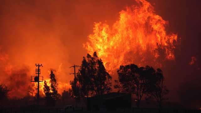 Wildfires are growing under climate change, and their smoke threatens farmworkers, study says