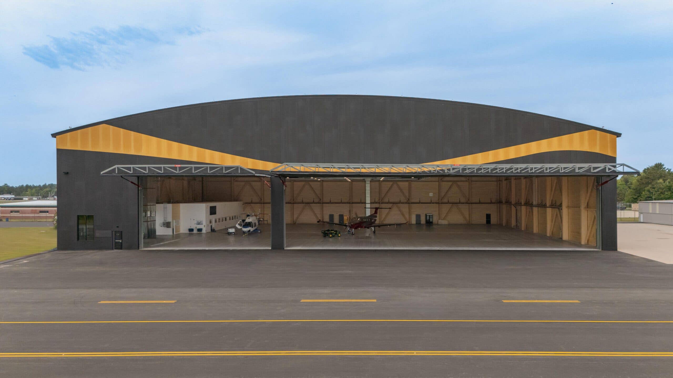 Aviation Construction Firm Finds Footing With High-End, Green Projects