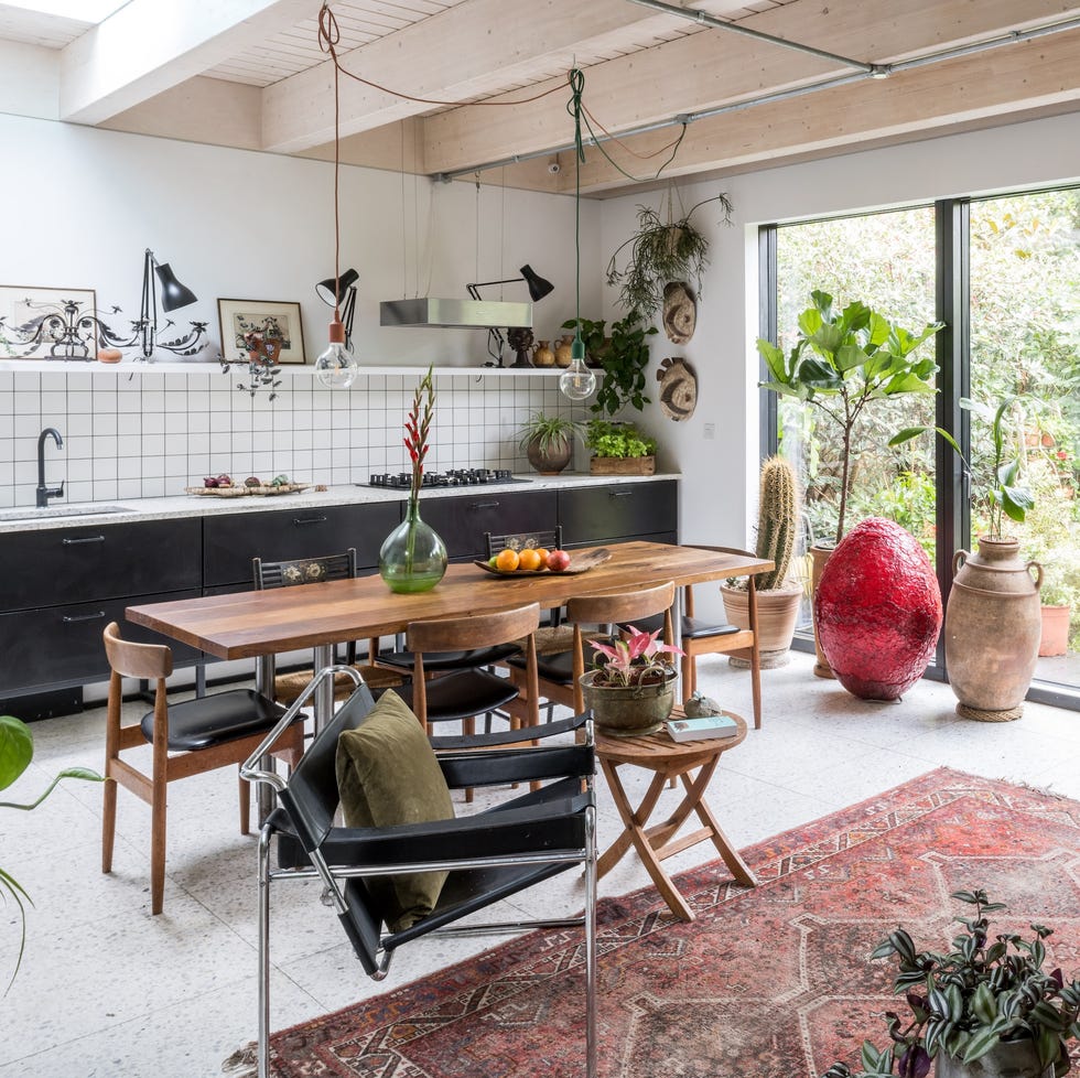 Inside a skinny infill house cleverly built on an overgrown garden